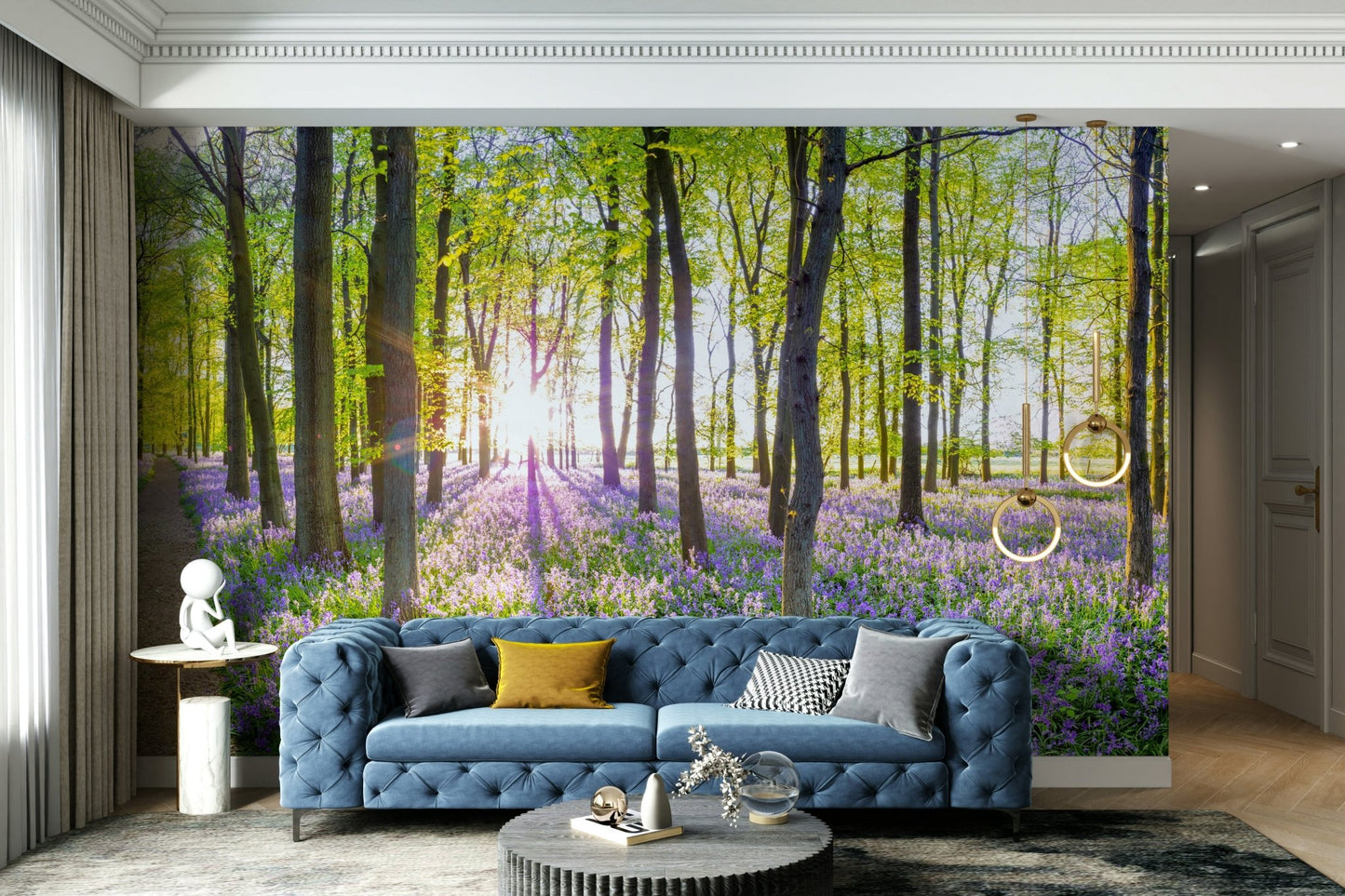 The ground is covered in a carpet of blue and purple flowers.

