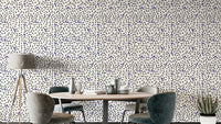 A detailed close-up of a whimsical wallpaper pattern.

