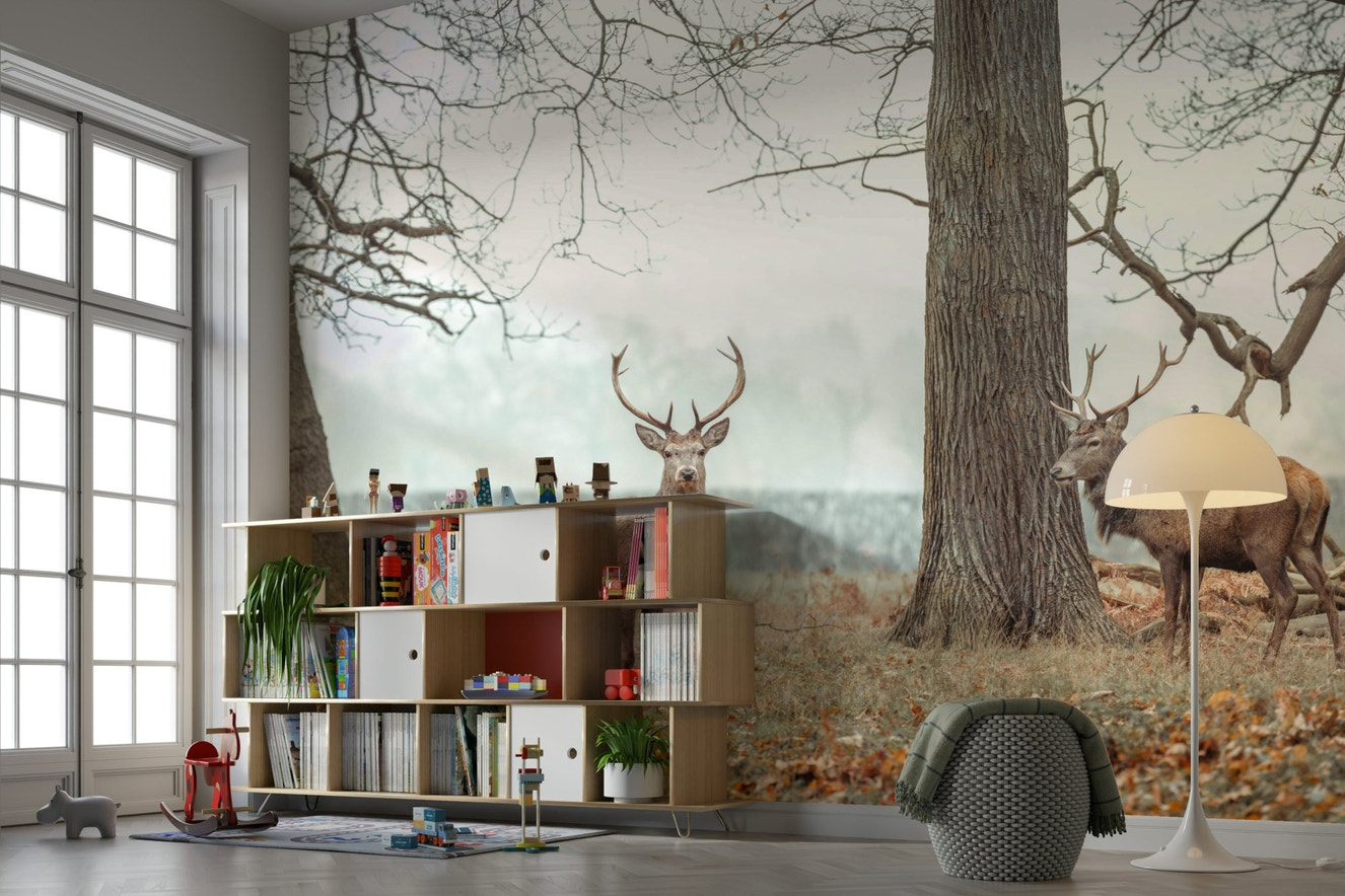 Stags in forest wall mural with natural tones

