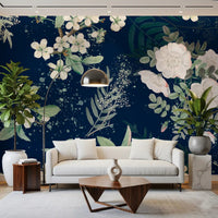 Elegant botanical wall mural showing pale blooms on a deep navy background