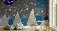 A beautiful starry night wallpaper mural with subtle mountain peaks in the foreground.
