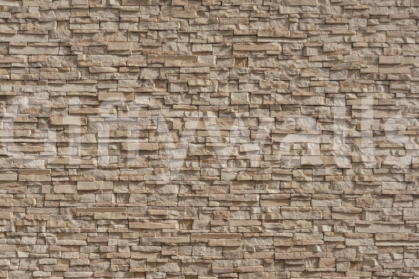 Textured Stone Cladding wallpaper on a living room wall.