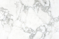 Seamless installation of the faux stone wallpaper for walls.