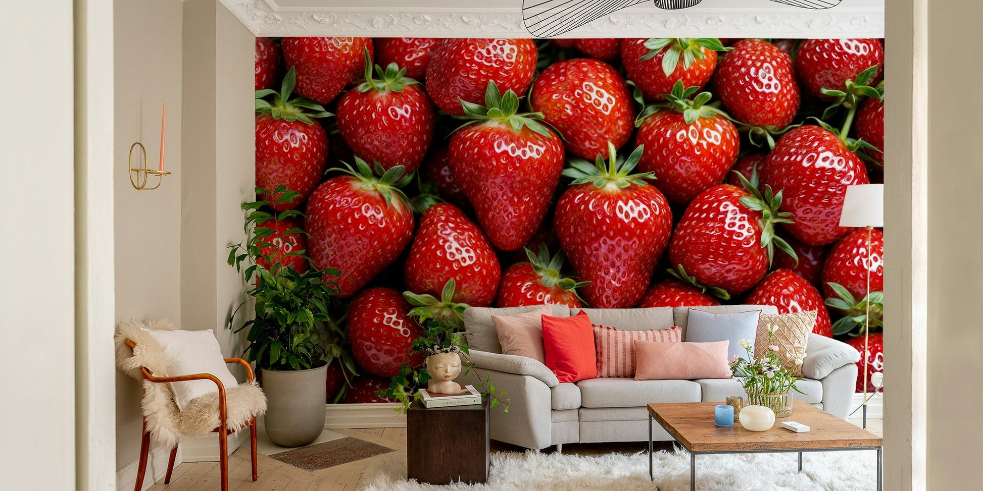 A wall mural with a repeating pattern of strawberries.
