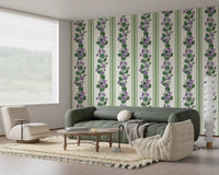 Vertical floral wallpaper with green leaves and violet bloom accents
