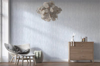 Reading nook with a cream linen armchair and brass floor lamp set against Modern Abstract Watercolor Strokes wallpaper GD9522