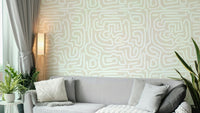 The background of the wallpaper is a soft, light grey.
