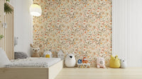 A bedroom with the wall mural behind the headboard.
