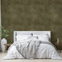 Olive-toned wallpaper mimicking soft suede finish.


