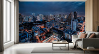 Cityscape wall mural with glowing lights and blue sky for office walls