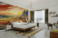 The sun is rising, casting a warm, golden glow on the flowers.

