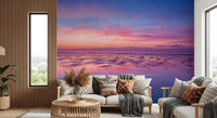 Spacious lounge framed by Sunrise at Beach Wall Mural and pastel sky gradient, GD8626