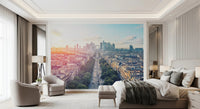 Sunrise Over Paris Wall Mural with an aerial view of a city boulevard