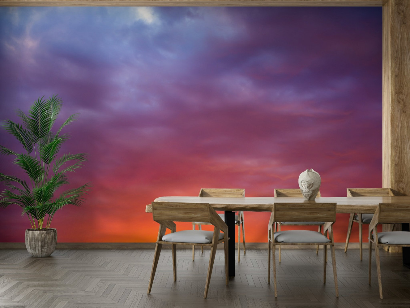 A beautiful vibrant sky wallpaper mural with a glowing sunset.

