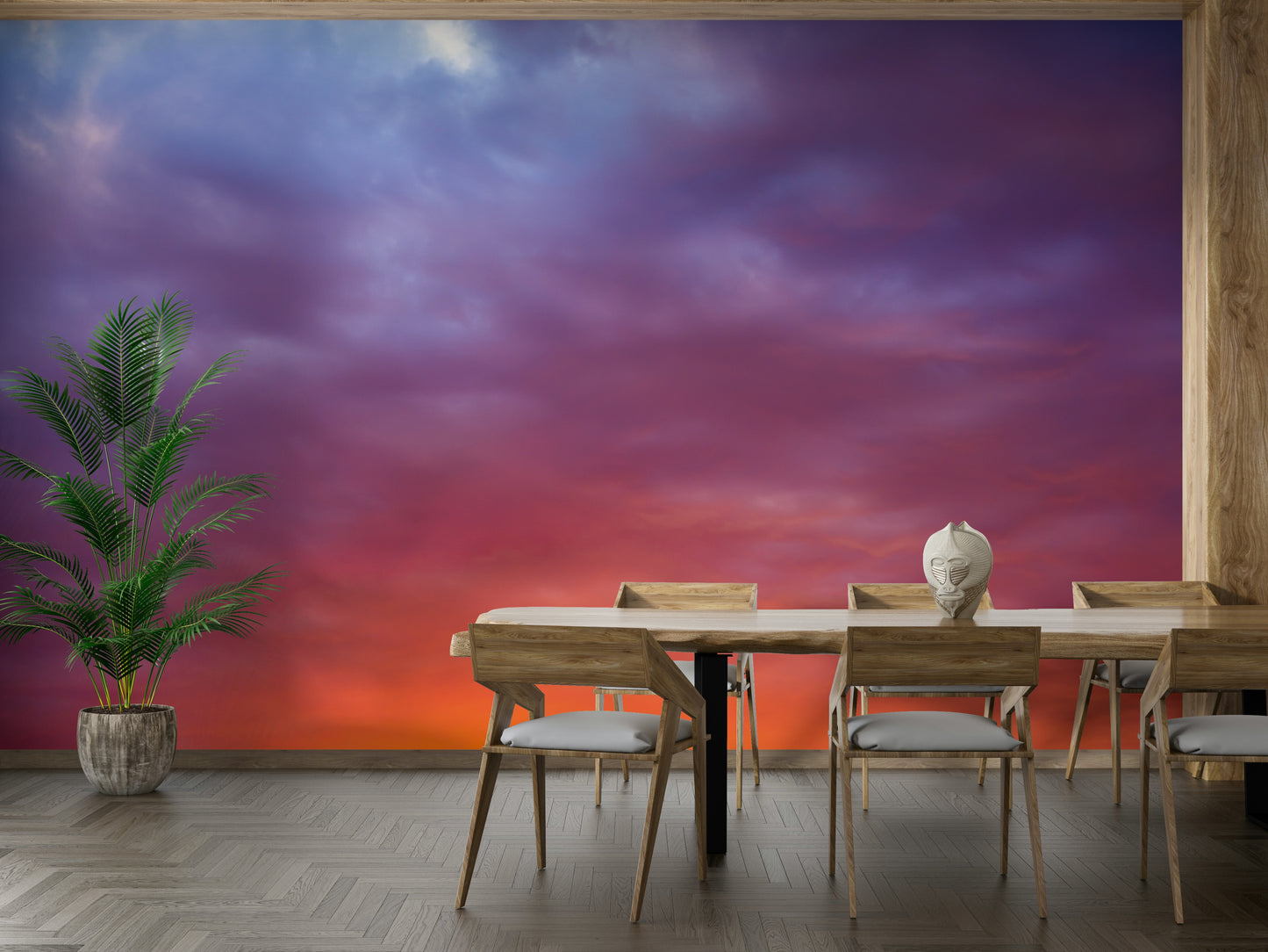 A beautiful vibrant sky wallpaper mural with a glowing sunset.

