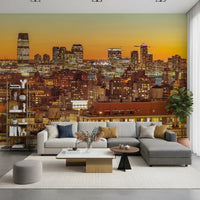 Sunset Metropolis wall mural with lit windows and rooftops