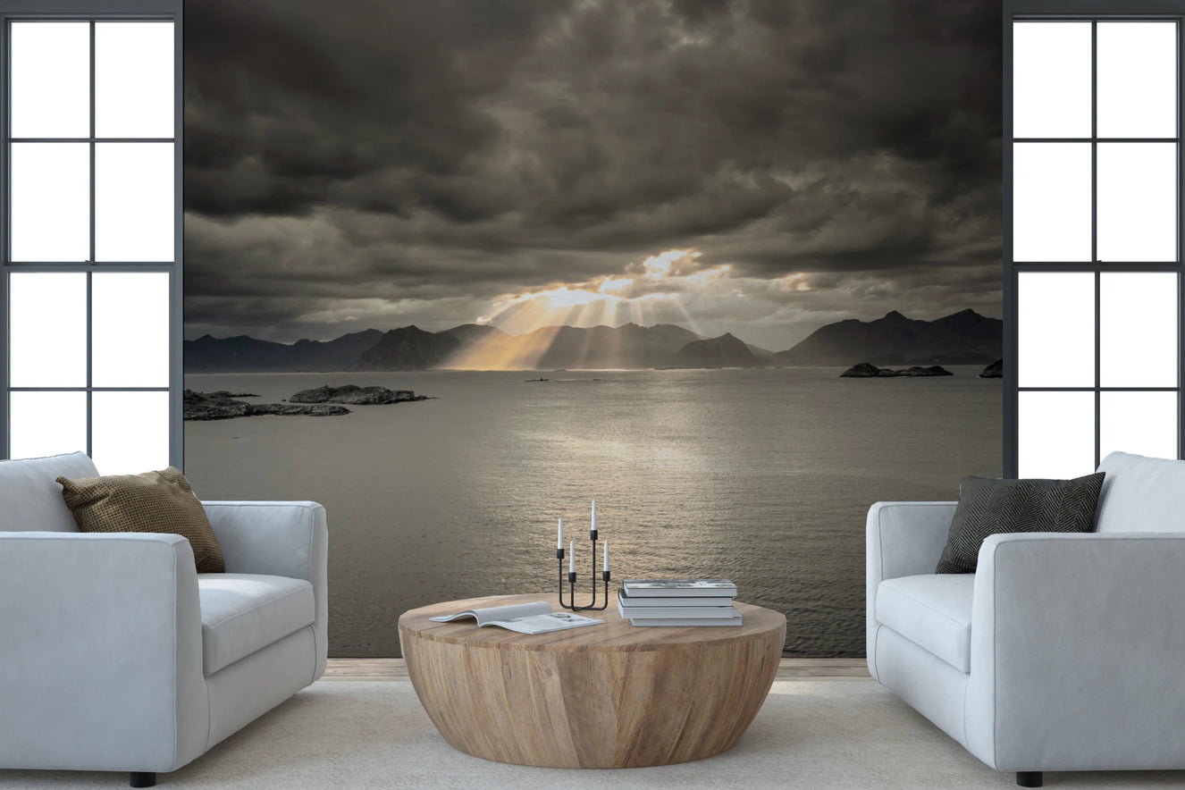 A scenic wall mural showing fjord mountains, open water, and evening light