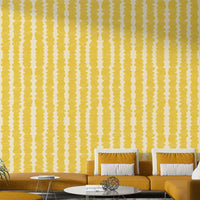 Abstract geometric wall design in yellow hues


