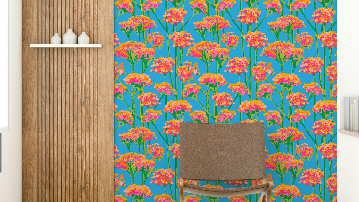 The mural is installed in a cheerful living room behind a simple, light-colored sofa. GD3656

