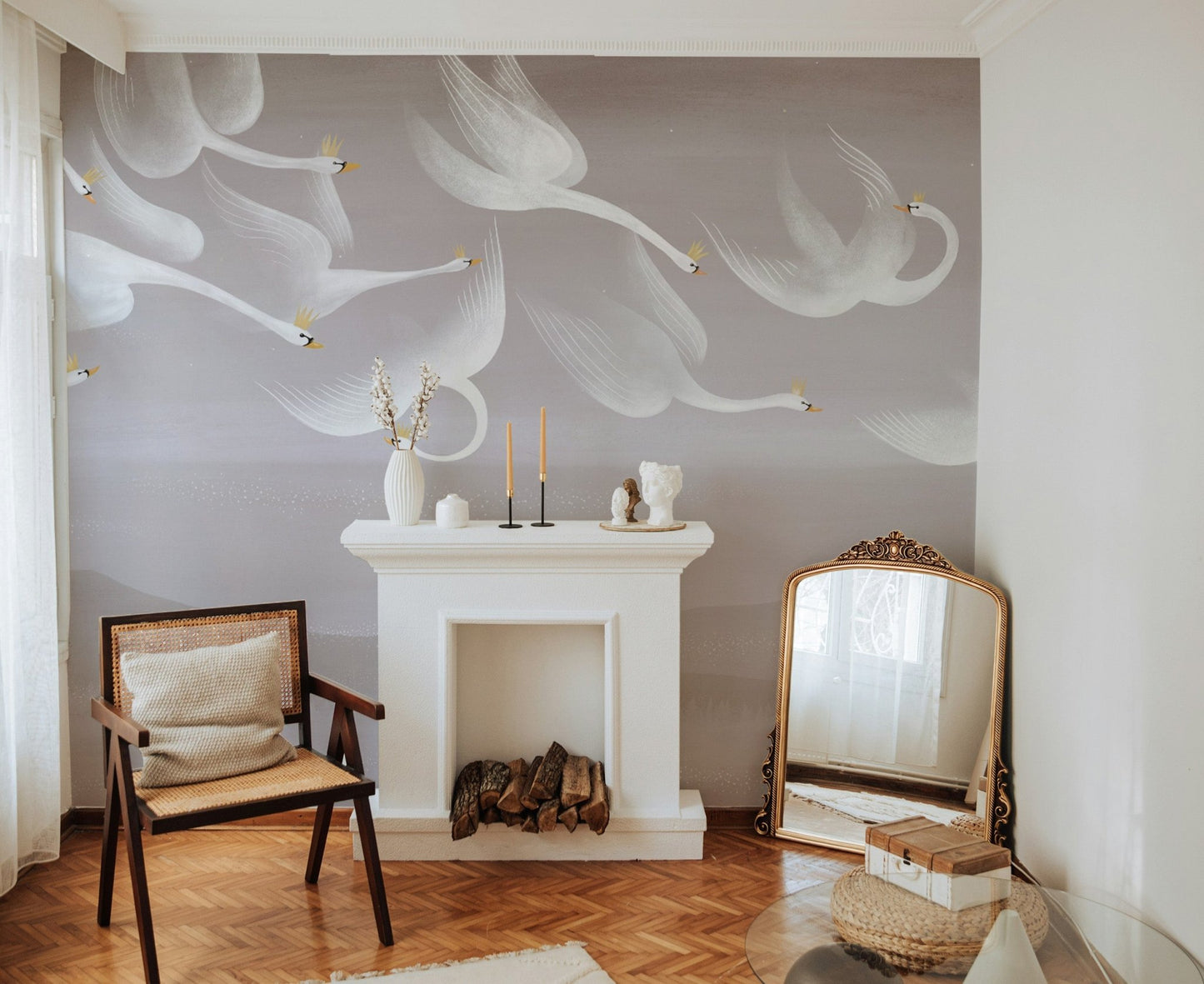 Tranquil wallpaper with swans over rolling hills
