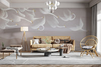 Graceful swans flying over misty hills mural

