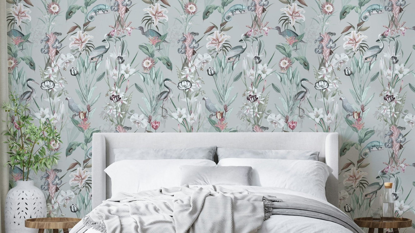 Whimsical cloud mural in soft pink and blue hues

