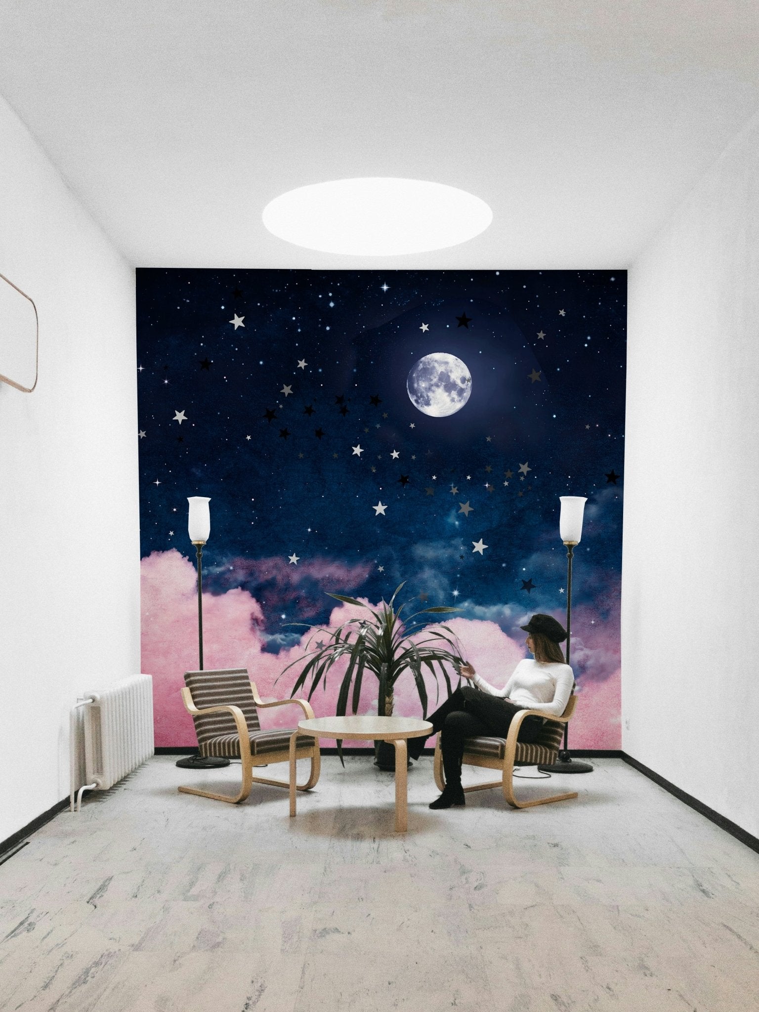 Night-themed mural with full moon and soft clouds

