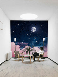 Night-themed mural with full moon and soft clouds

