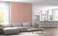 Soft striped Sweet Stripes Wallpaper across a bright modern open-plan lounge