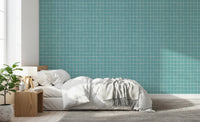 Teal blue grid wallpaper with woven linen texture