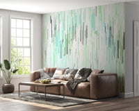 Abstract wall mural with teal mint gray and yellow falling geometric strokes