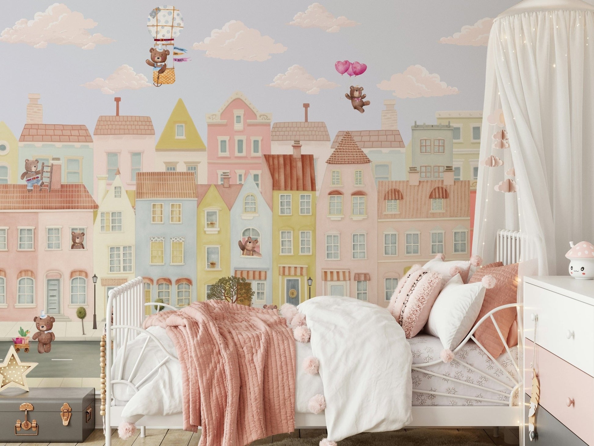 Teddy's Town Wall Mural behind a wooden toy chest in a nursery wallpaper.