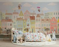 Soft blue and green hills on a textured wall mural for a baby room wallpaper.