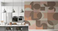 Neutral tone geometric wall art for a modern bedroom.