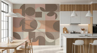 Modern geometric wall mural in soft neutral clay tones.