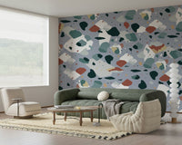 An artistic modern terrazzo mural on minimalist wallpaper.