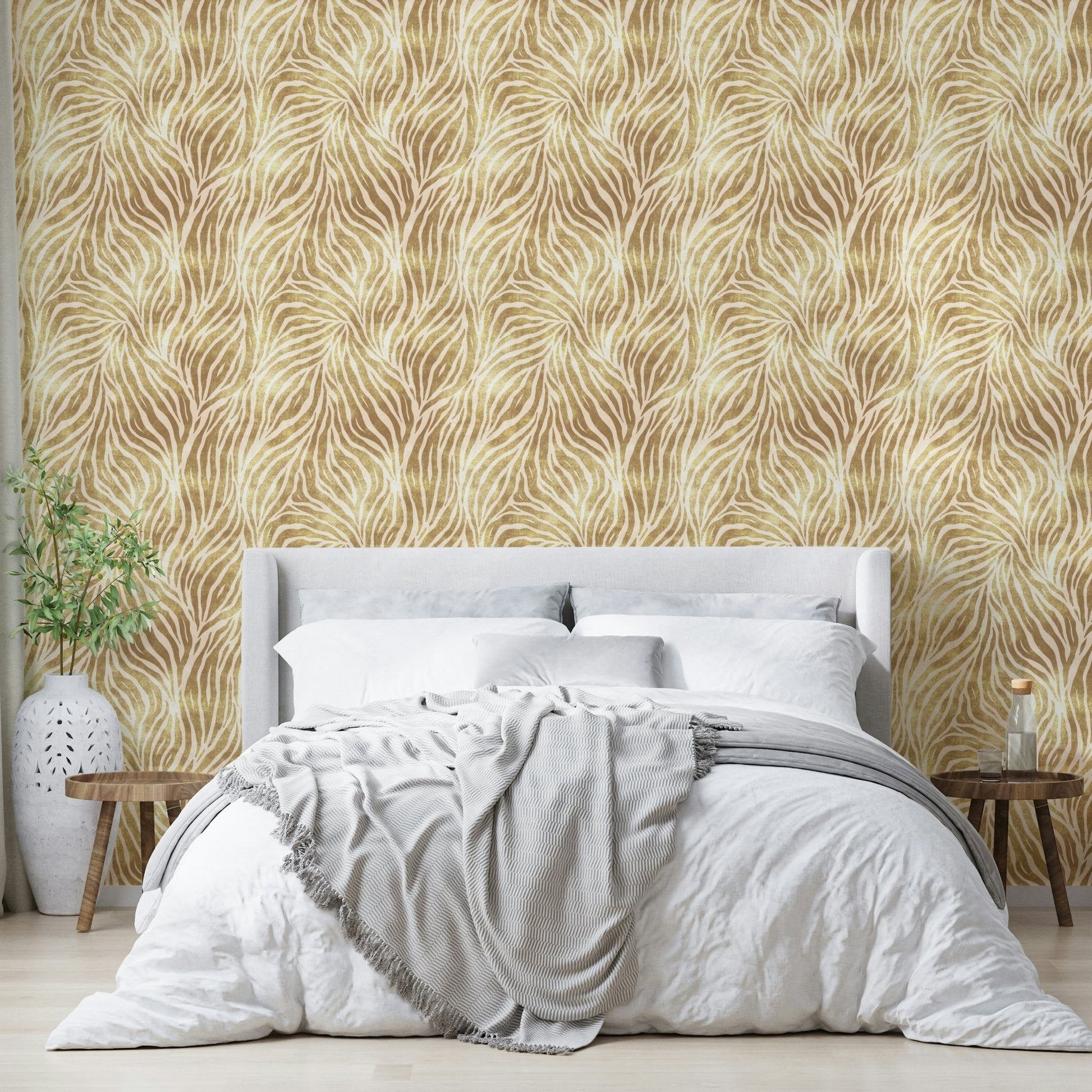 Metallic gold tones in zebra print wallpaper

