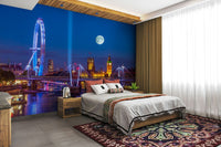 Iconic landmarks are visible against the colorful sky.

