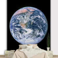 The continents are a mix of green, brown, and white.

