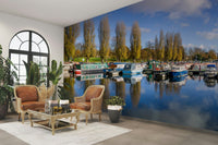 Nautical-themed mural with a picturesque harbor view.

