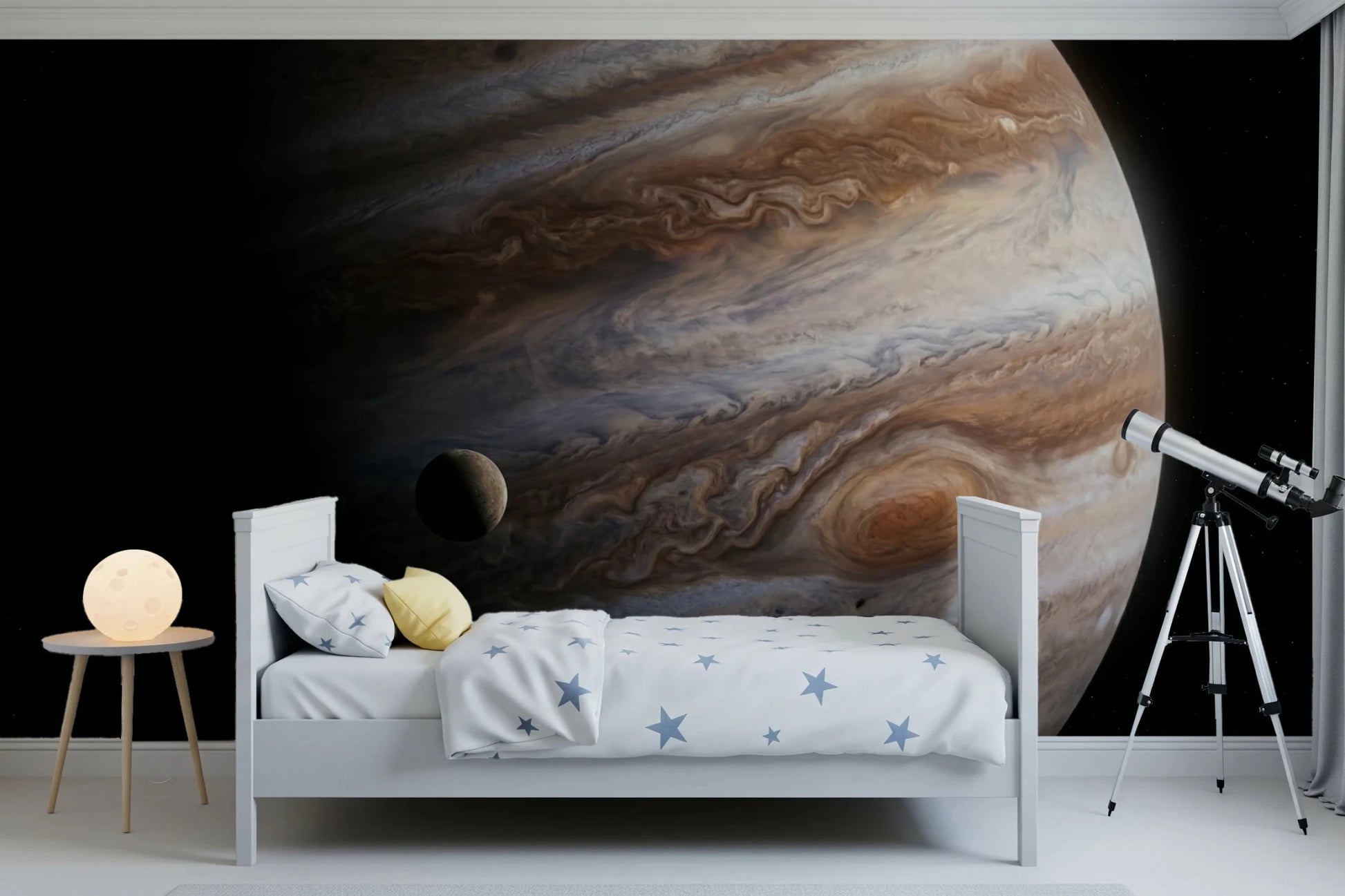 A telescope and crisp white bed sit dramatically against this swirling planet wall mural
