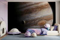 This child’s room feels bright and imaginative with the giant planet mural in view