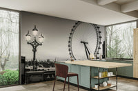 The setting appears to be a city riverbank.

