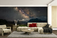 Milky Way above rolling hills in astronomy wallpaper

