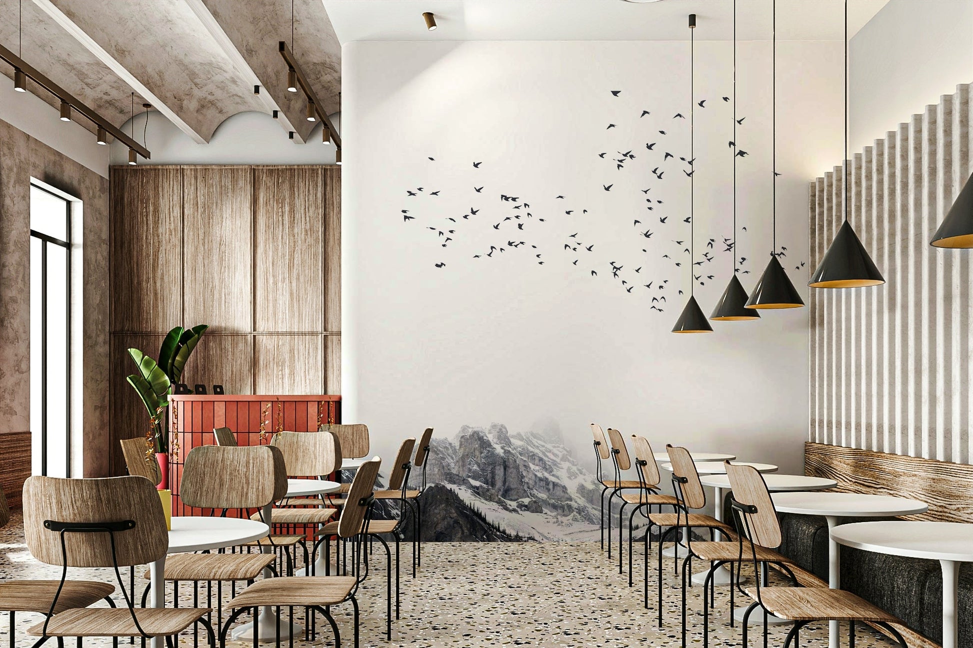 The scene depicts a mountain range, possibly with snow, forests, or a clear sky.
