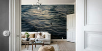 A peaceful seaside view mural on decorative wallpaper.

