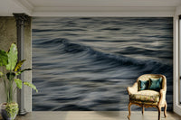 A peaceful moving water mural on decorative wallpaper.

