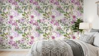 Bedroom styled in Blooming Waterfall wallpaper with trailing purple flowers