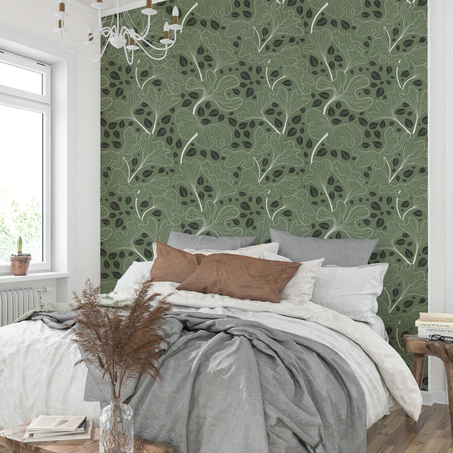 Design featuring leaves outlined in white on a green background.

