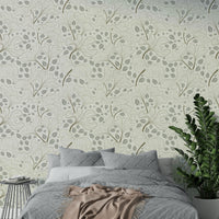 Design featuring leaves outlined in brown and filled in with light gray/blue.

